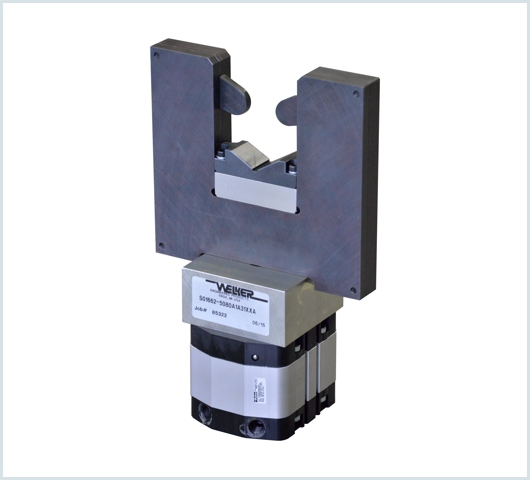 Tube clamp features an interchangeable spacer for multiple diameter tubes